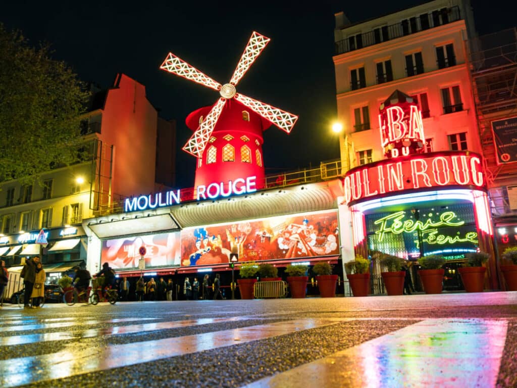 View of the vibrant LED lights at the Moulin Rouge at night time