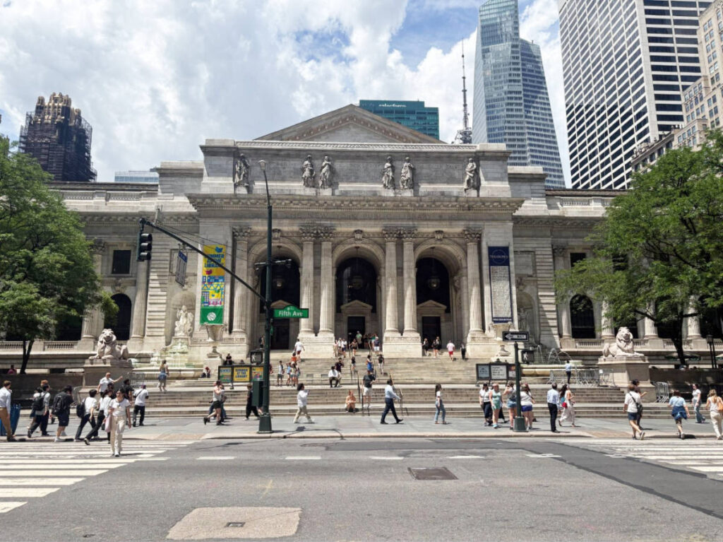 People passing by the The New York Public Library building