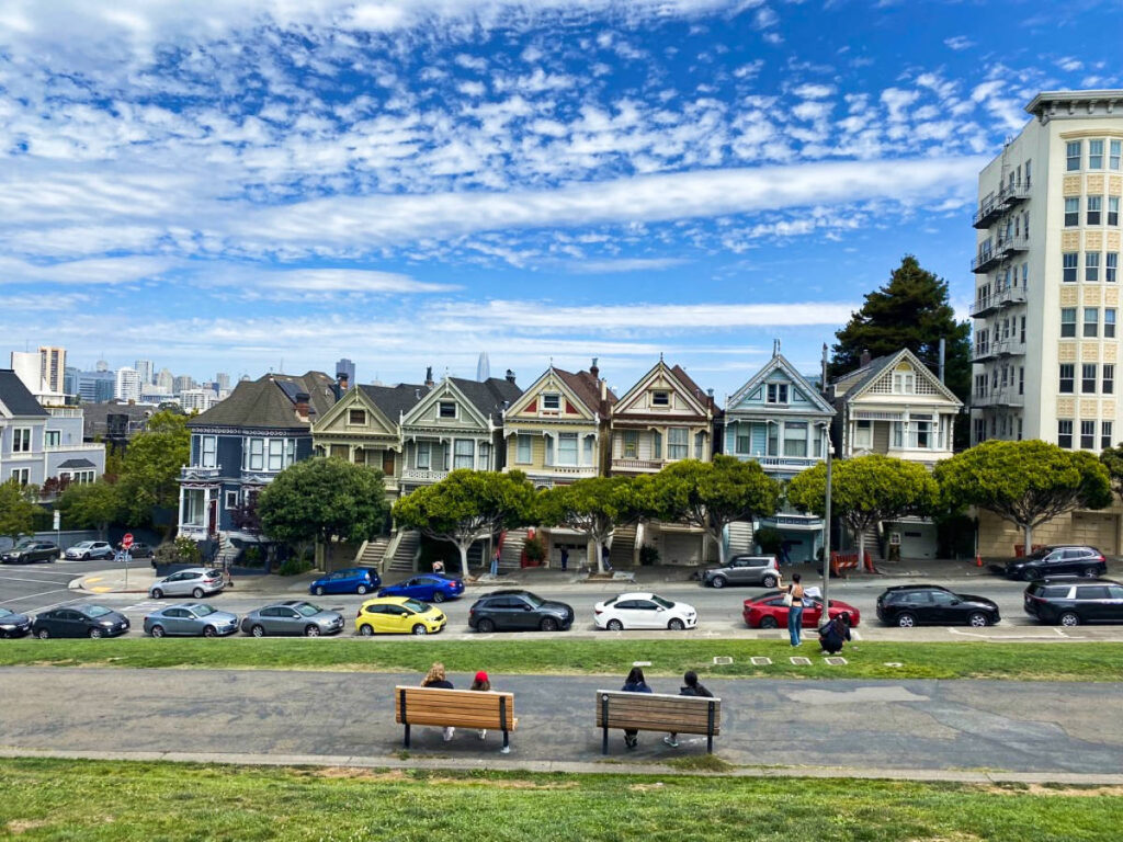 View of the colorful Victorian houses at Alamo Square