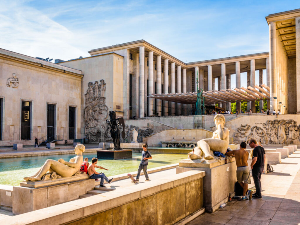 View of the tourists chilling at the fountain in The Palais de Tokyo on a sunny day