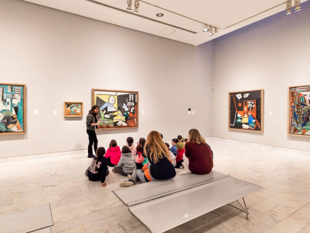 A teacher teaching the students inside the Picasso Museum