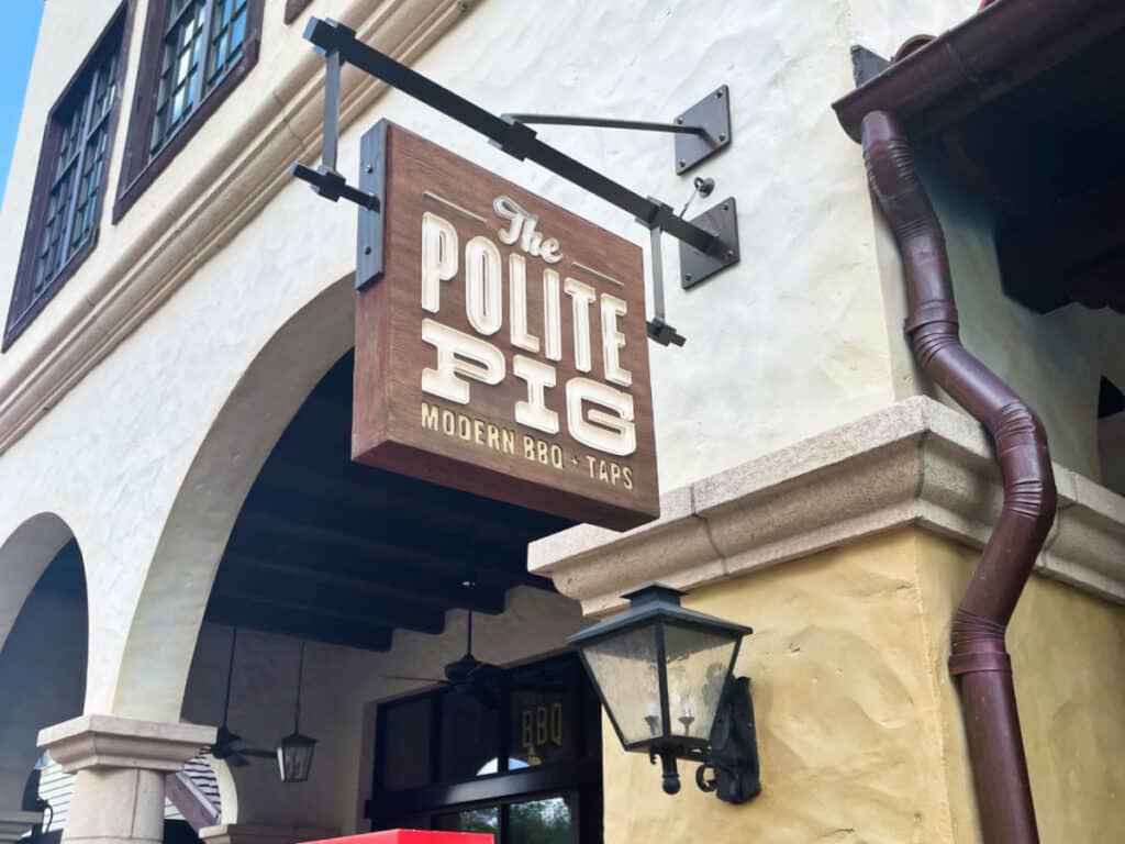 View of the signage of The Polite Pig outside near the entrance