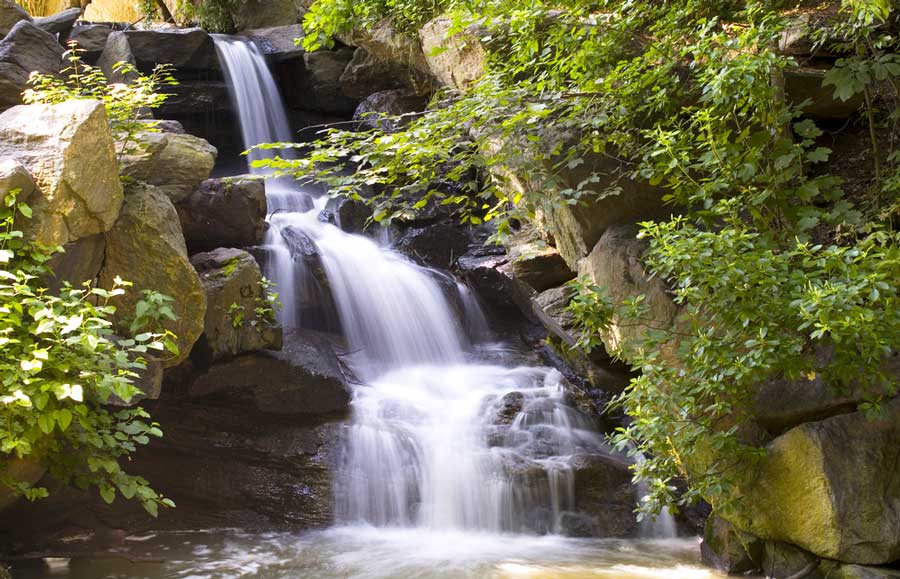 Scenic view of a waterfall at the North Woods in Central Park
