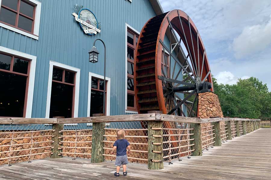 The author's son in front of The Riverside Mill and Market