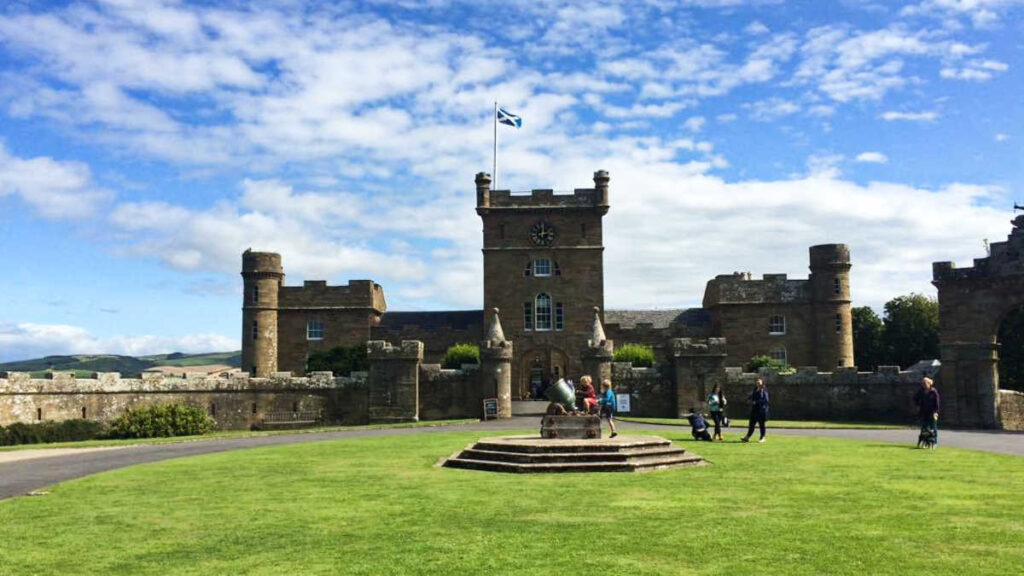 Panoramic view of the landscape around the Culzean Castle and the Saltire above