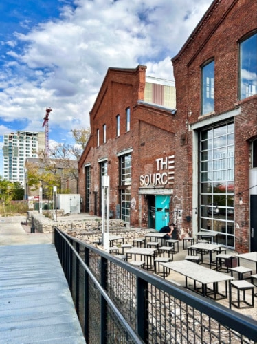 Exterior view of the waterfront The Source Hotel in Denver