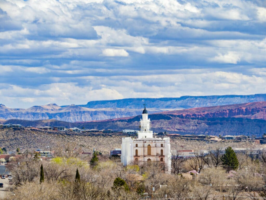 The St. George Utah Temple in the middle of the cityscape of St. George