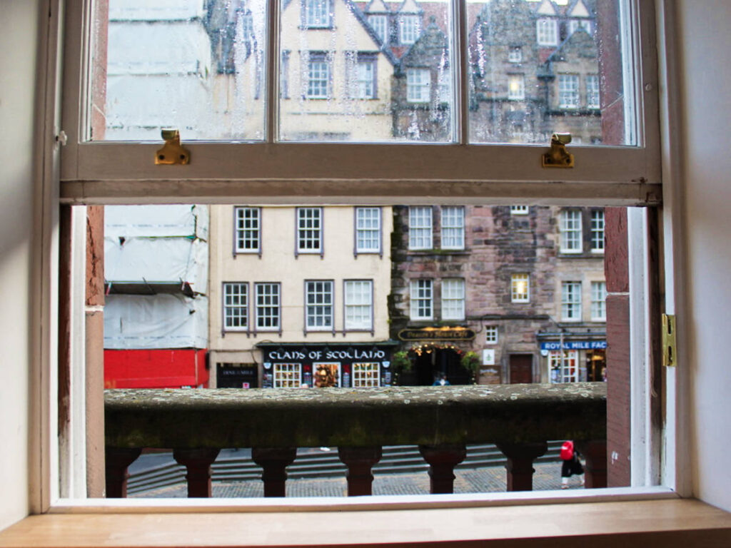 An open window looking out the street