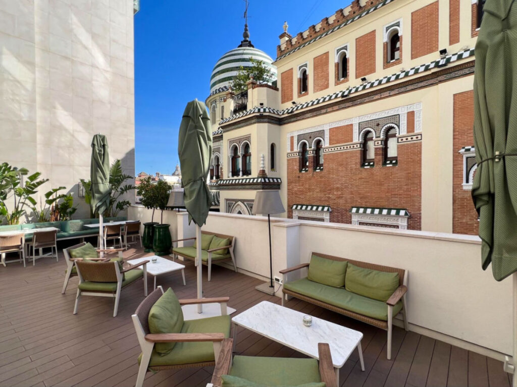 Cozy outdoor table and chairs on the Terrace of Querencia de Sevilla