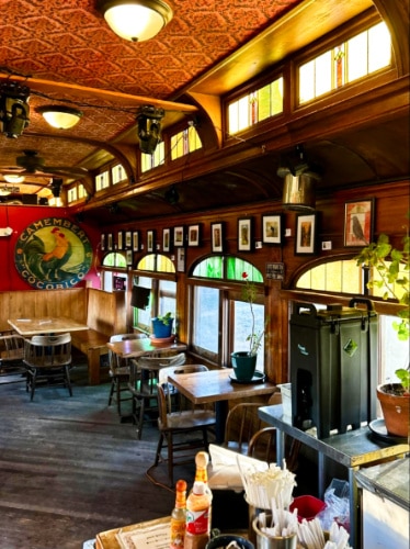 Interior view of The Train Cars Coffee and Kava