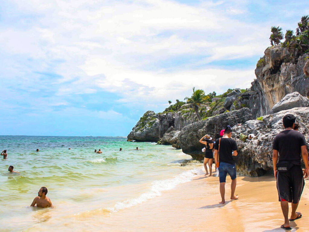 People swimming at the Tulum Beach