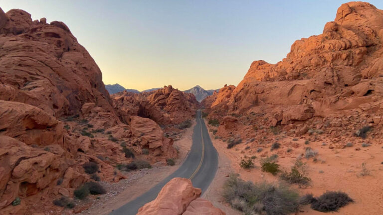 A road surrounded by the red rocks of Valley of Fire State Park