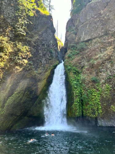 Friends swimming at The Wahclella Falls