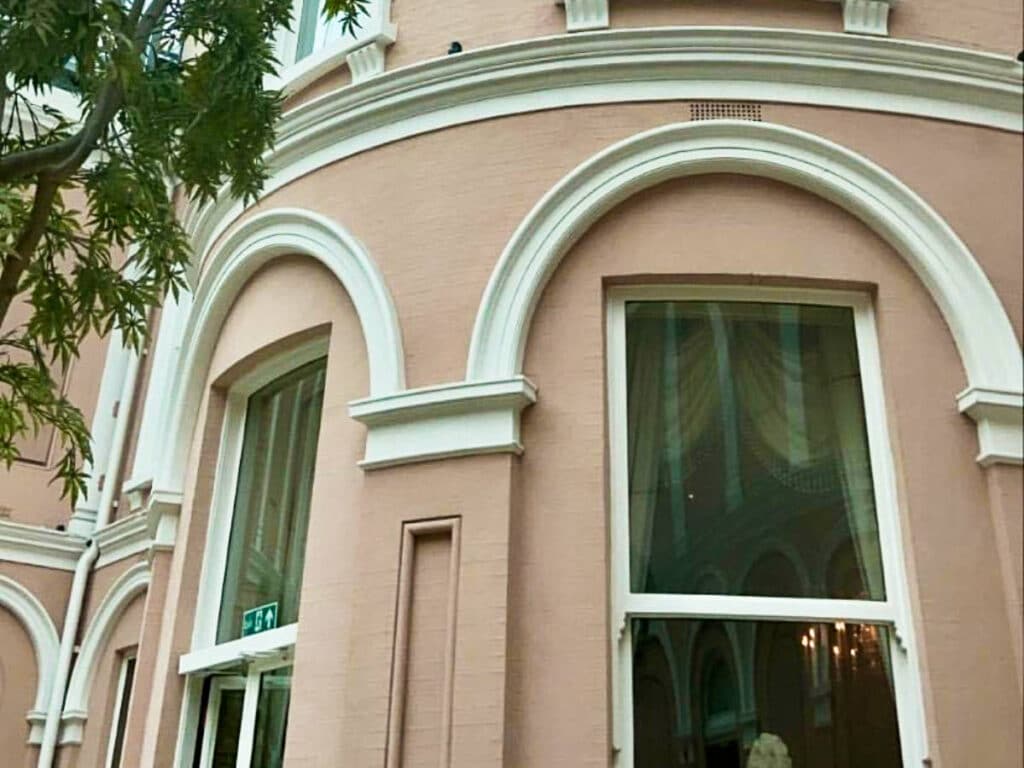 View of the pretty pink exterior of The Wallace Collection in Marylebone