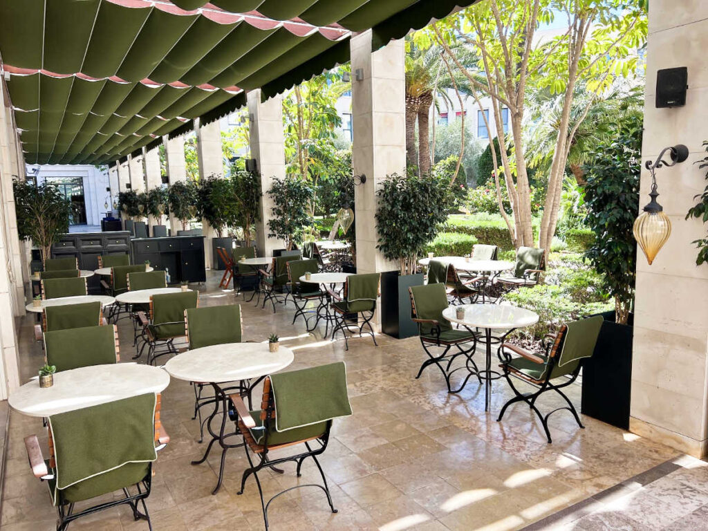 View of the terrace of The Westin Cafe surrounded by greenery