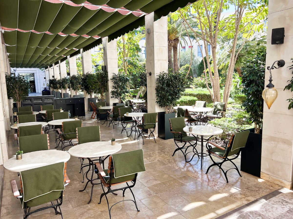 View of the terrace of The Westin Cafe surrounded by greenery