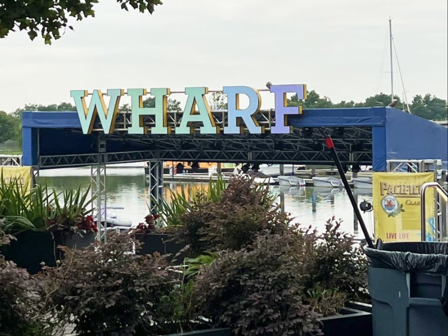 View of the signage WHARF near the river