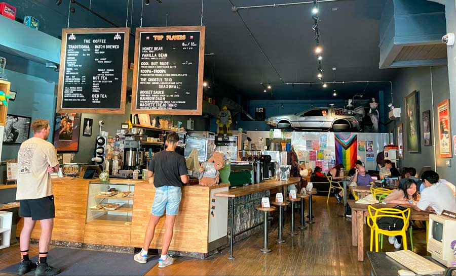People ordering and enjoying their drinks inside The Wormhole