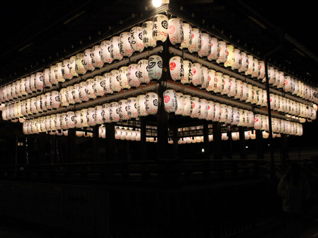 Evening view of Yasaka Shrine in Gion adorned with multiple lanterns