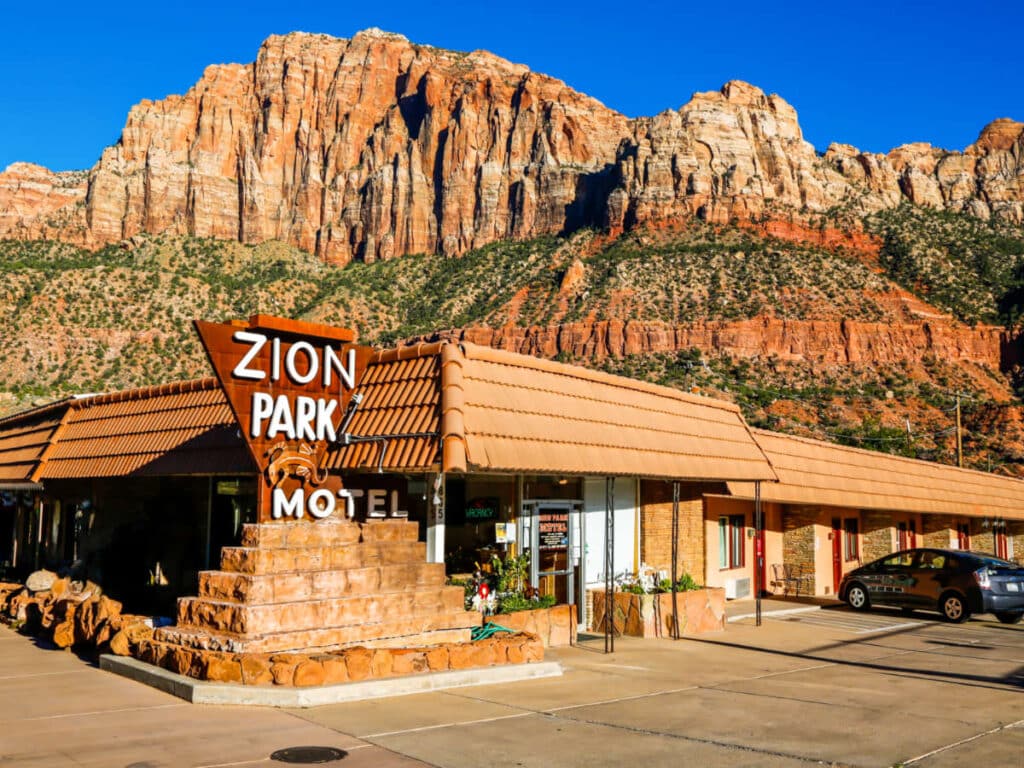 Exterior view of The Zion Park Motel complementing the colors of the rock formations in the background