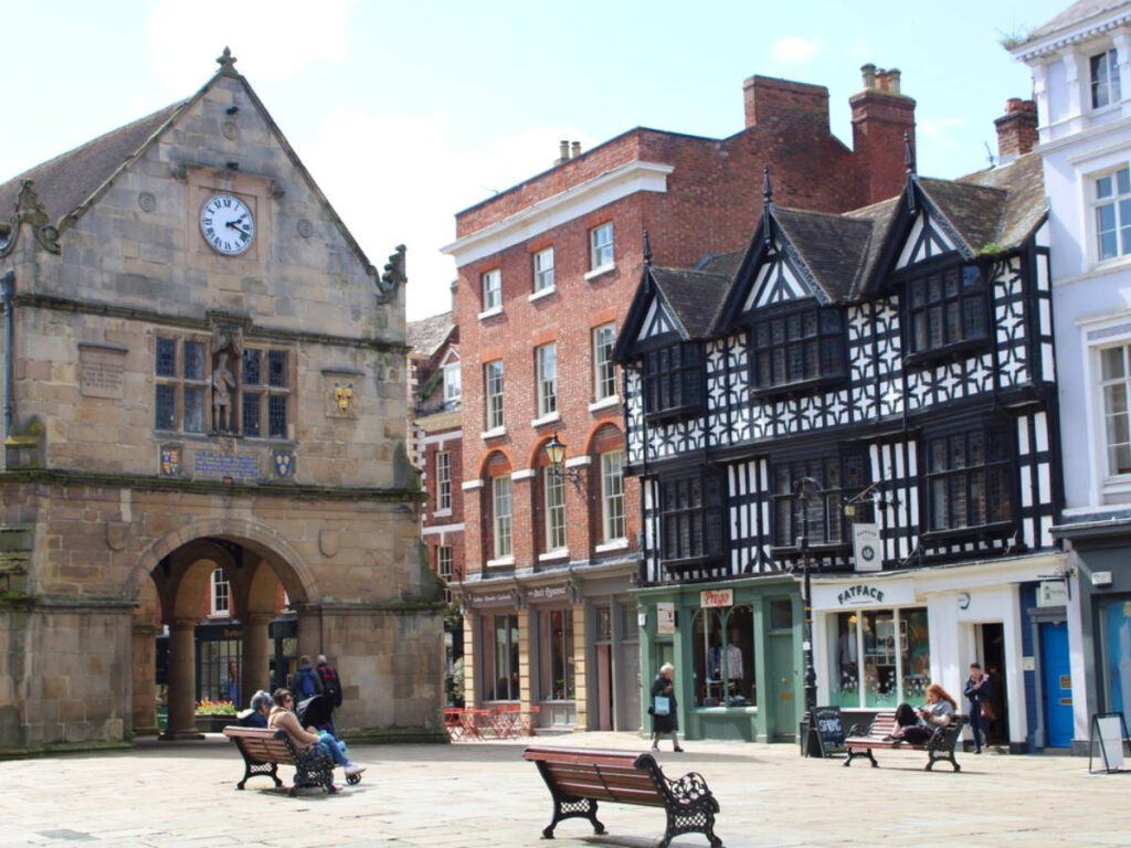 People relaxing on The square in Shrewsbury