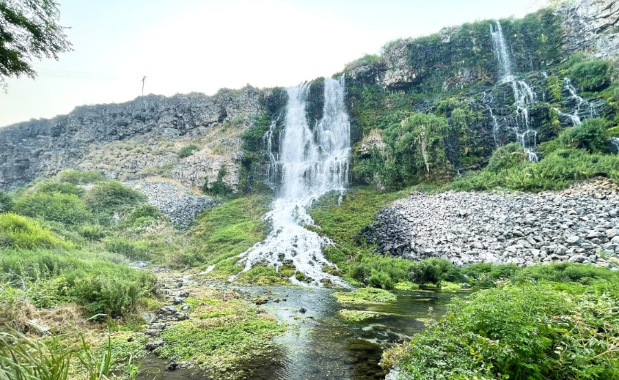 Stunning view of the waterfall and crystal-clear spring water at Thousand Springs State Park at Ritter Island