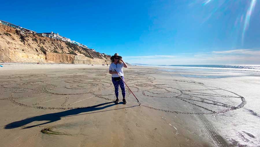The author holding a stick in Tide Beach Park