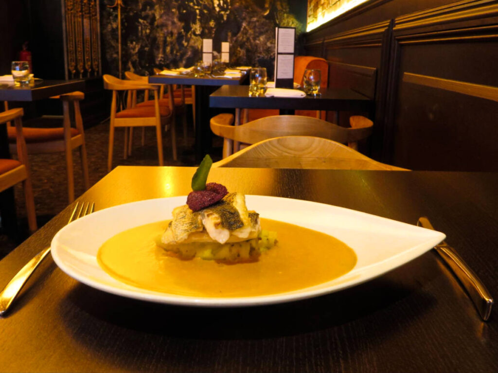 A plate of the Tiffin Seabass at Purple Poppadom
