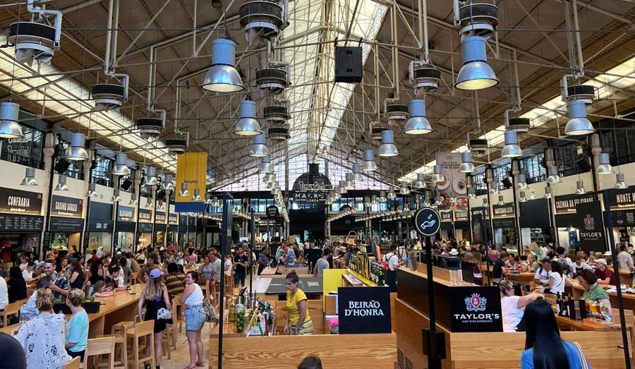 View of people at the different shops in Time Out Market Lisbon