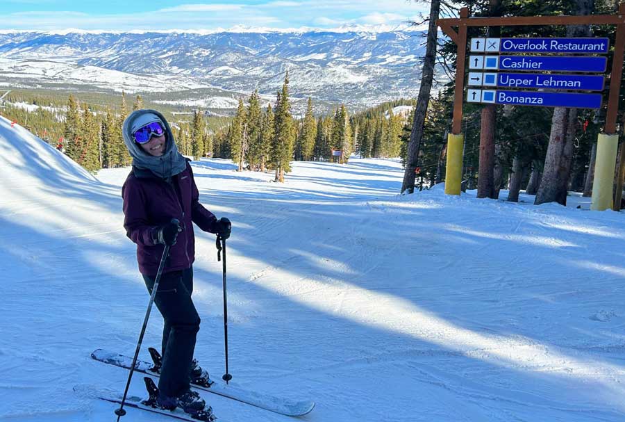 The author smiling for a photo at the top of E-Chair
