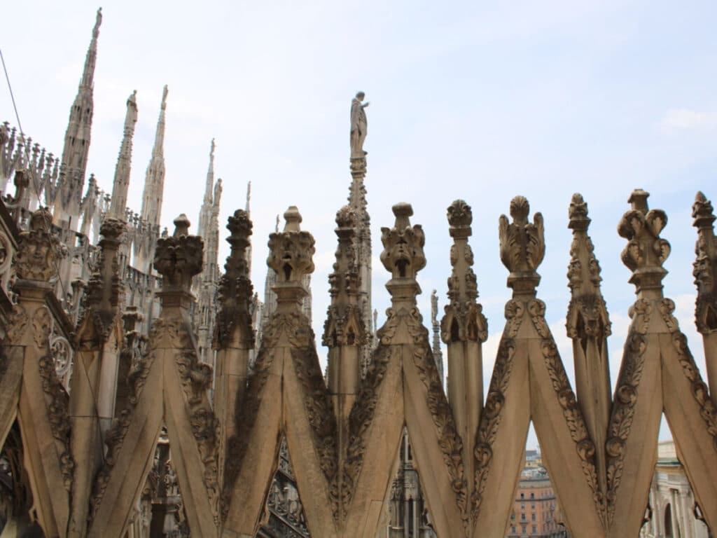 Closeup view of the intricate details at the top of Duomo di Milano