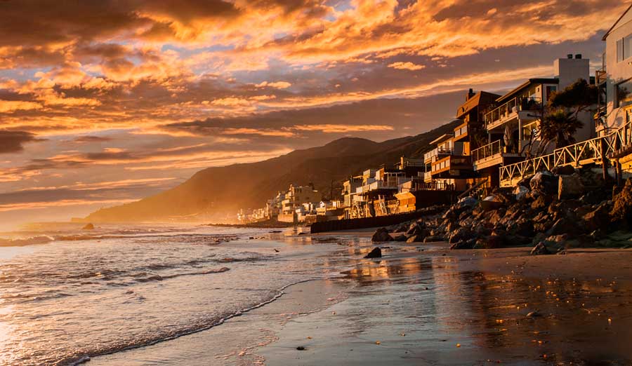 View from the shoreline of Topanga Beach during sunset