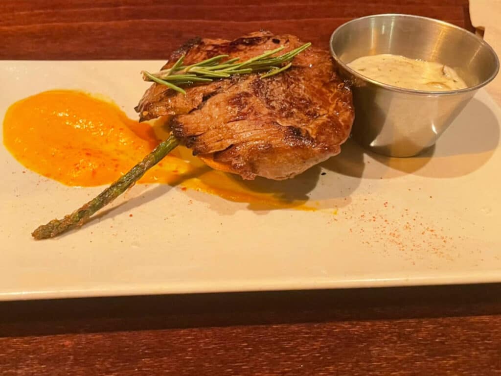 Steak served on a plate in Tosca Del Carme
