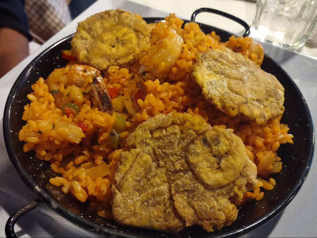 Closeup look of the tostones served over paella