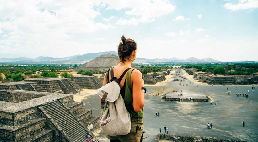 A tourist admiring the view from Teotihuacan