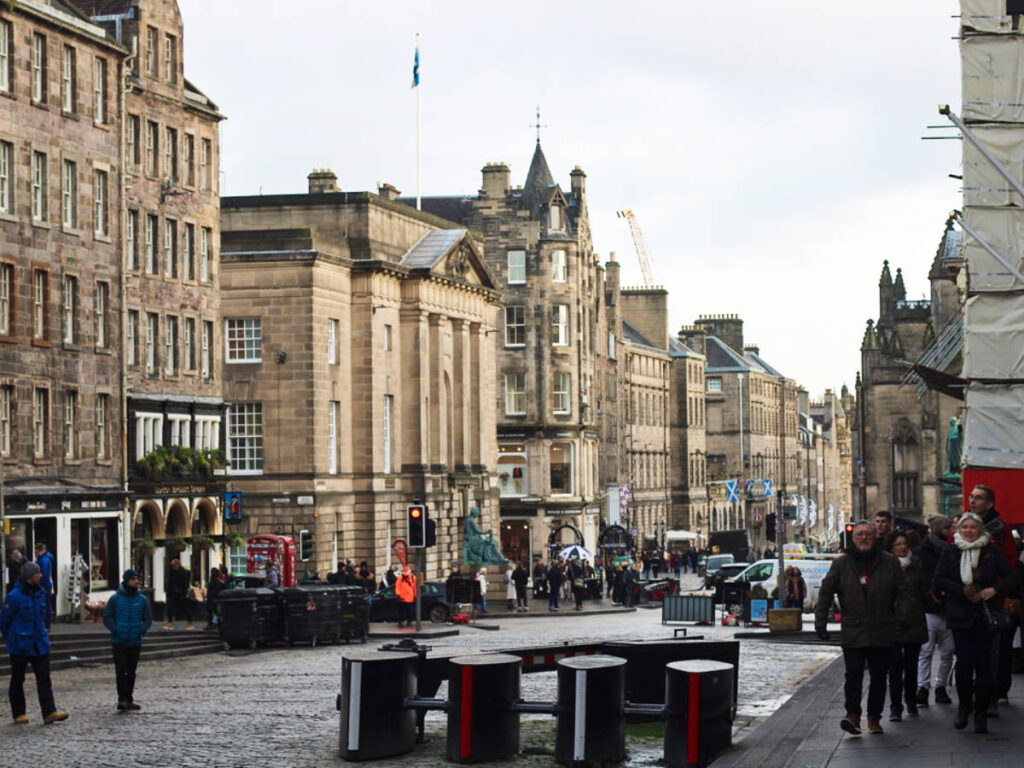 The tourists wandering around the Royal Mile