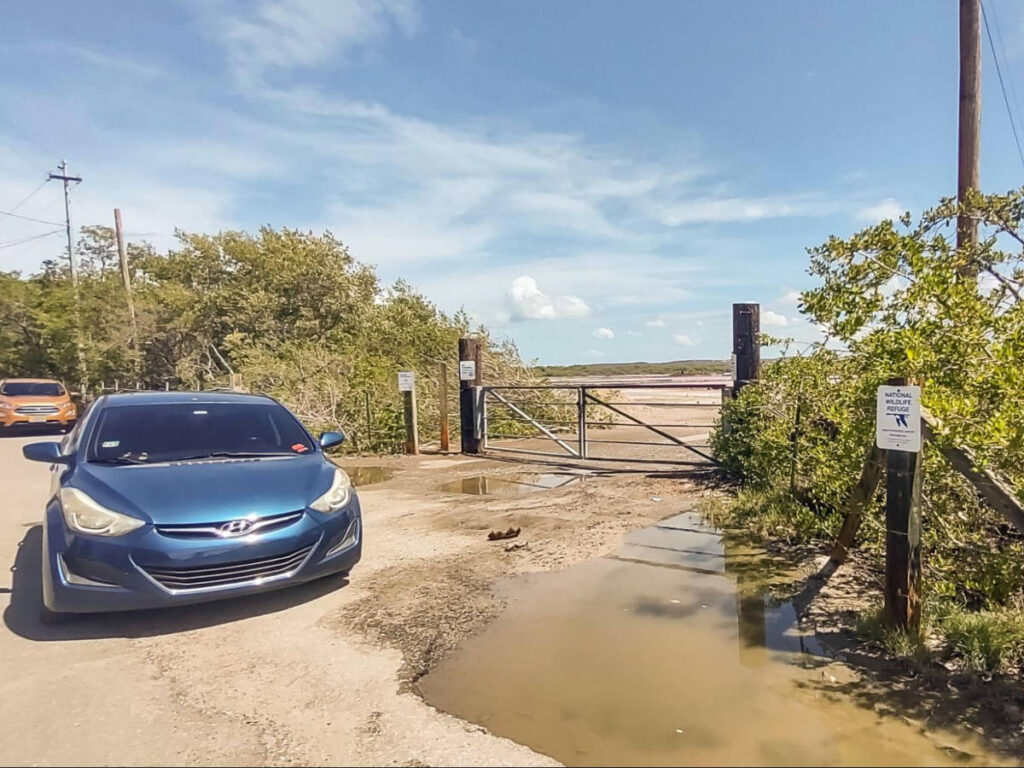 A tourist’s car at the entrance of Cabo Rojo Wildlife Refuge