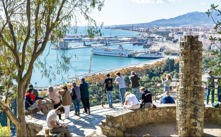 Tourists enjoying the scenic view from Gibralfaro Viewpoint