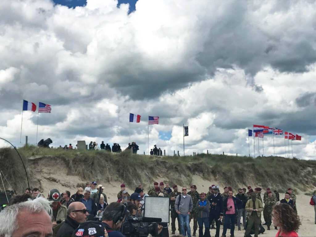 A group of tourists visiting at the D-Day Beaches