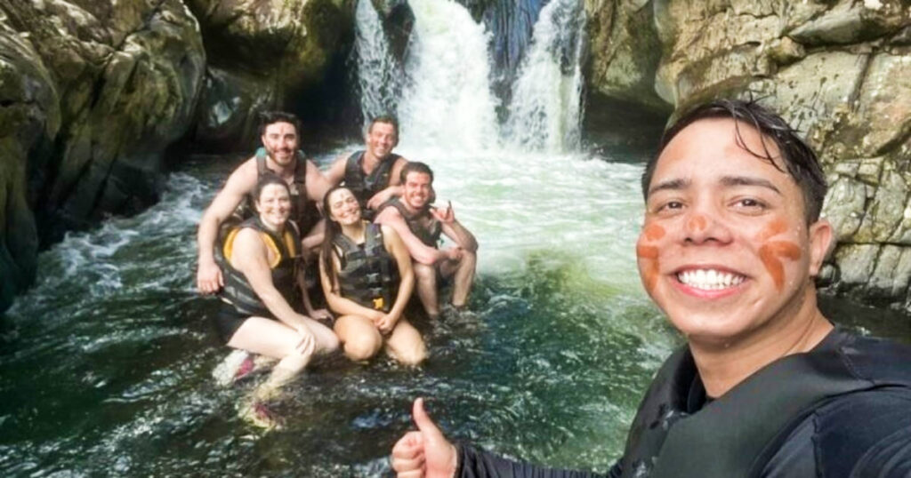A group of tourists enjoying the waterfalls