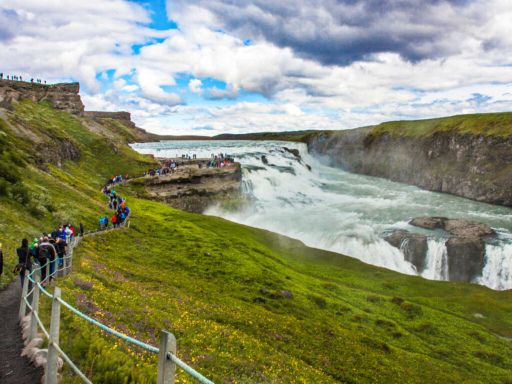 Line of tourists near the Gullfoss Waterfall in Iceland
