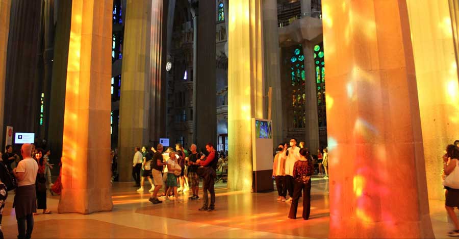People inside a building wit a beautiful interior in Spain