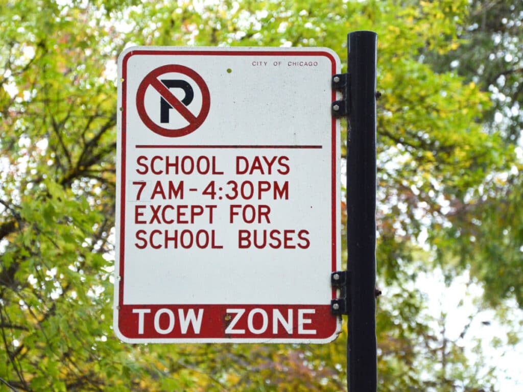 Closeup look of the tow zone sign