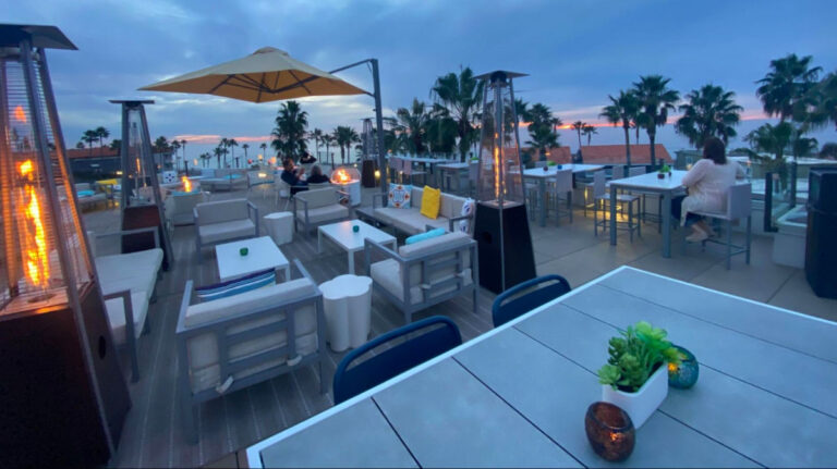 View of cloudy sunset at Tower39 Rooftop Lounge