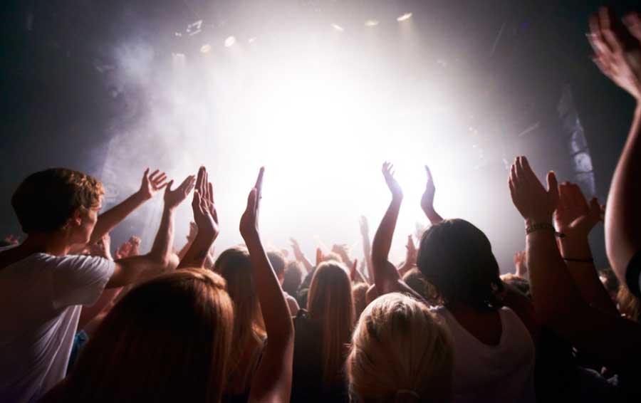 People enjoying a performance inside the Toyota Arena