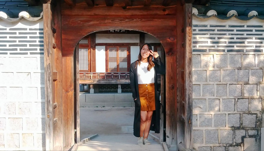 View of the author in front of a Korean traditional house