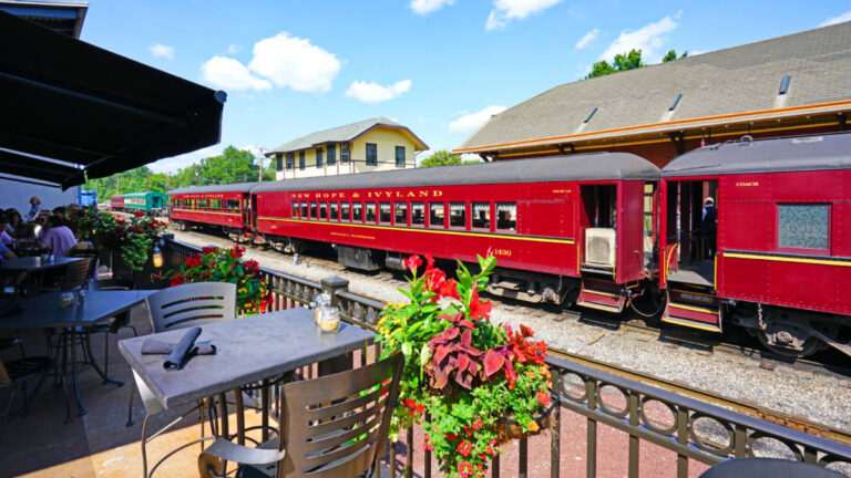 A red train on the New Hope and Ivyland railroad