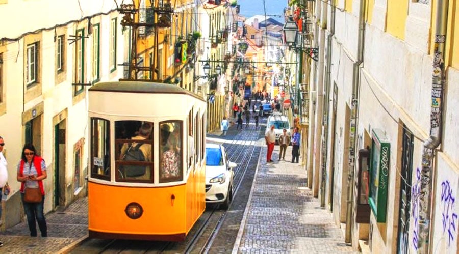 View of a Elevador da Bica with passengers on it