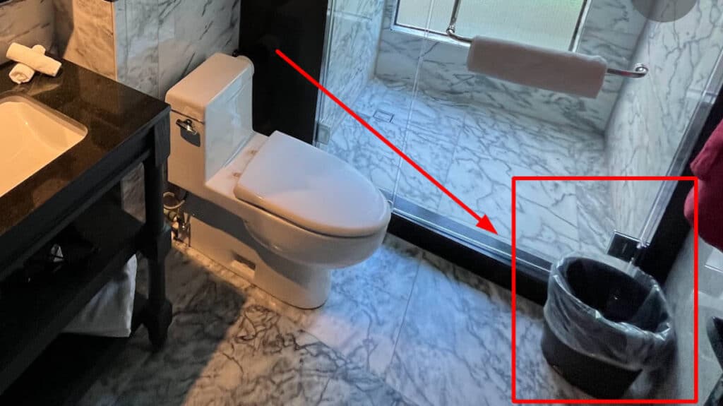 View of a trash can inside a bathroom
