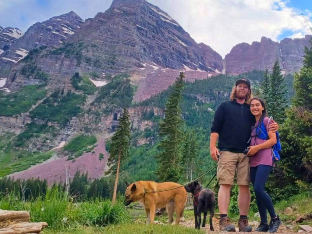 Editor Abigail with her husband and their dogs at the Maroon Bells in Aspen, Colorado